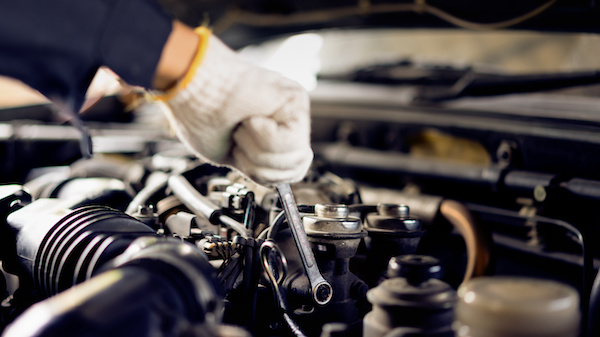 mechanic checking engine tune-up | Pro Drive in Corpus Christi, TX